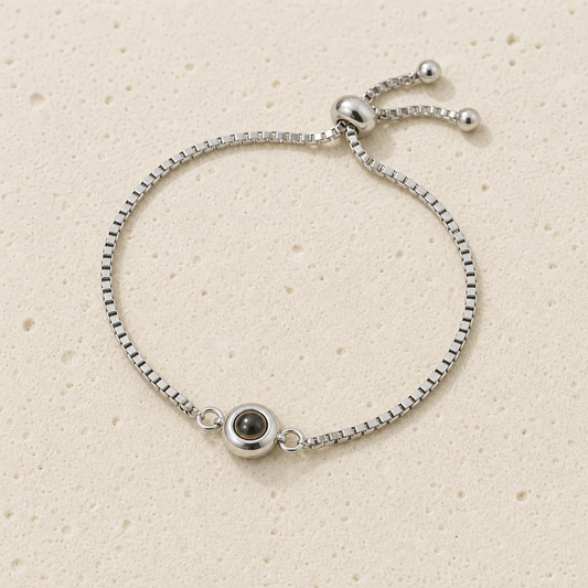 Custom photo projection bracelet in a silver-toned finish